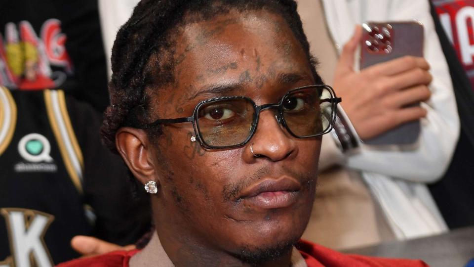 PHOTO: In this Feb. 3, 2022, file photo, rapper Young Thug attends a game between the Phoenix Suns and the Atlanta Hawks, in Atlanta. (Paras Griffin/Getty Images, FILE)