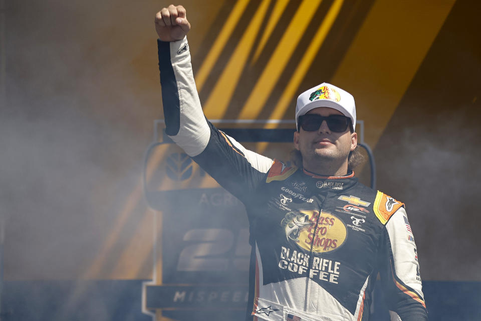 BROOKLYN, MICHIGAN - AUGUST 06: Noah Gragson, driver of the #9 Bass Pro Shops/TrueTimber/BRCC Chevrolet, walks onstage during driver intros prior to the NASCAR Xfinity Series New Holland 250 at Michigan International Speedway on August 06, 2022 in Brooklyn, Michigan. (Photo by Sean Gardner/Getty Images)