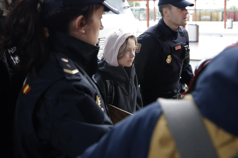 Climate activist Greta Thunberg arrives in Madrid on Friday Dec. 6, 2019. Climate activist Greta Thunberg has arrived by train in Madrid, where a global U.N.-sponsored climate change conference is underway. The Swedish teen is scheduled to join thousands of other youth later on Friday in a march to demand negotiators and politicians real action in tackling the planet's rising temperatures. (AP Photo/Andrea Comas)