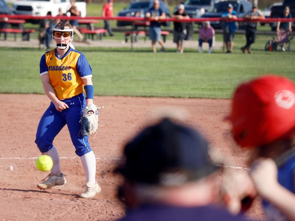Kadie Bare fires a pitch during visiting West Muskingum's 12-0 win in five innings against Crooksville on Thursday in McLuney.