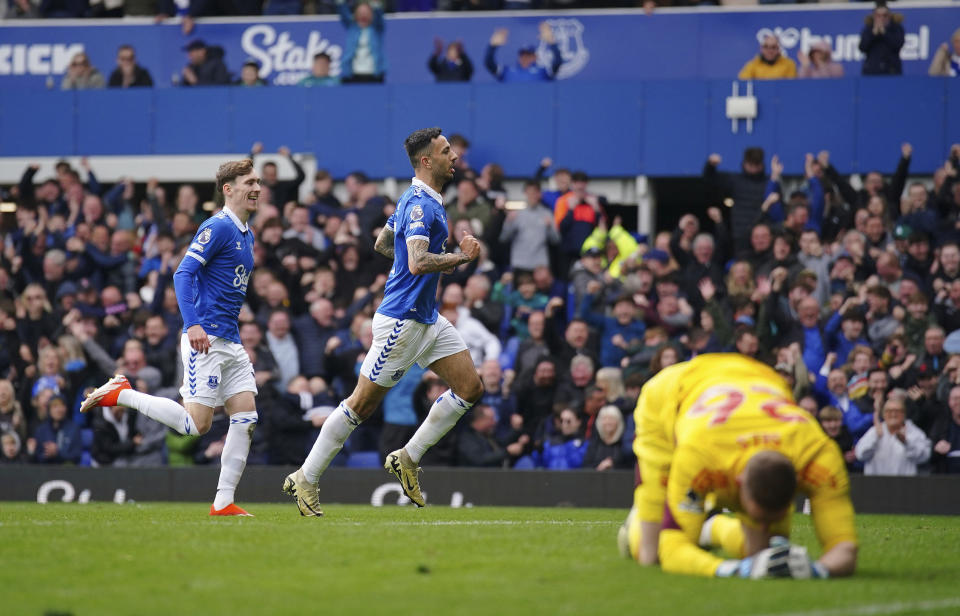 Everton's Dwight McNeil, centre, celebrates scoring their side's second goal of the game during the English Premier League soccer match between Everton and Nottingham Forest at Goodison Park, Liverpool, England, Sunday April 21, 2024. (Peter Byrne/PA via AP)
