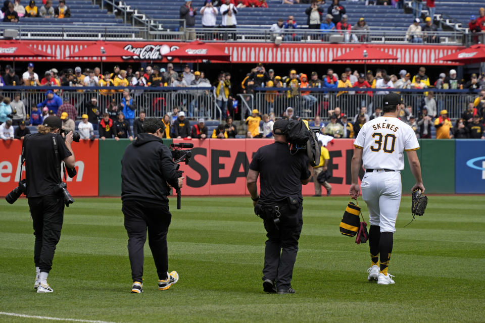 Pittsburgh Pirates starting pitcher Paul Skenes (30) heads to the bullpen to warm up for his major league debut before a baseball game against the Chicago Cubs in Pittsburgh, Saturday, May 11, 2024. (AP Photo/Gene J. Puskar)