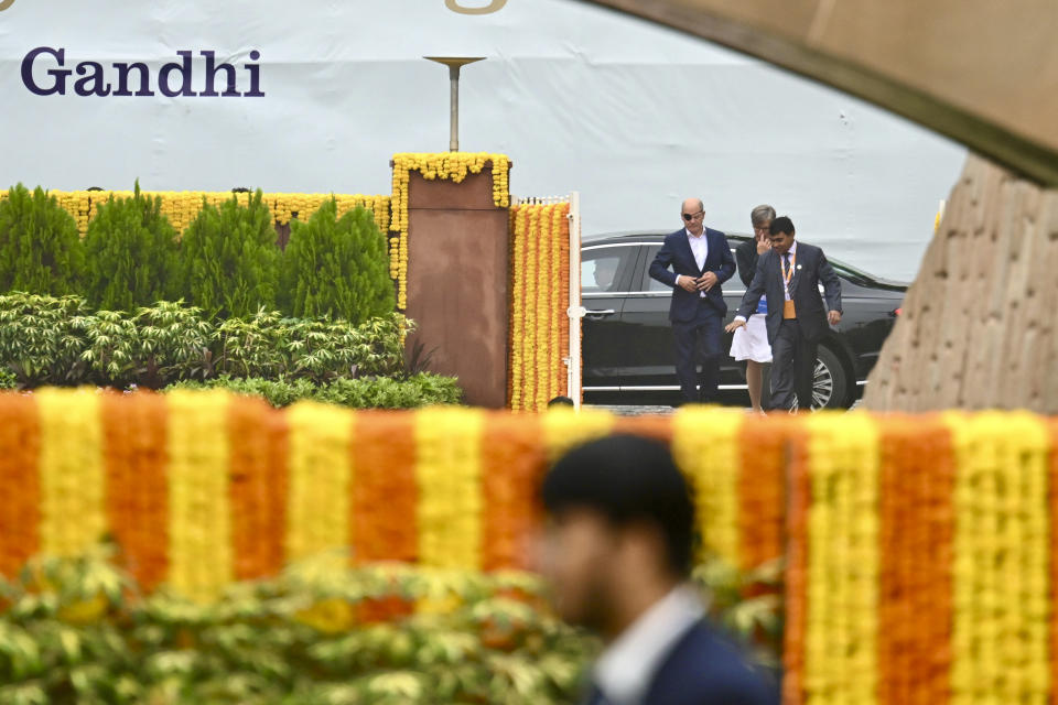 German Chancellor Olaf Scholz arrives to pay his respects at the Rajghat, Mahatma Gandhi memorial, in New Delhi, India, Sunday, Sept. 10, 2023. (AP Photo/Kenny Holston, Pool)