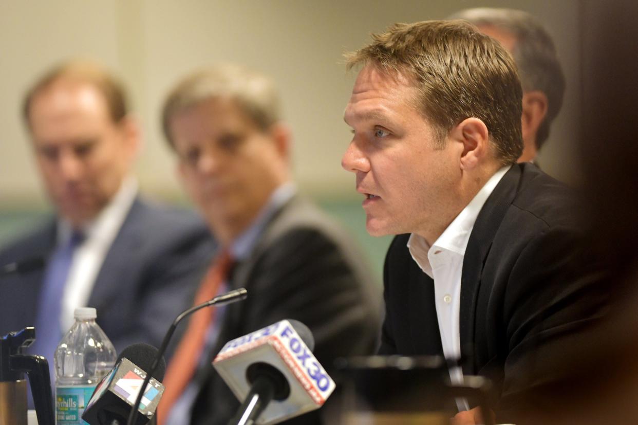 Aaron Zahn, the Chairman of the Jacksonville Electric Authority reads a statement during a Jacksonville City Council hearing in December 2019.