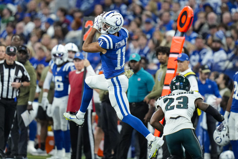 Indianapolis Colts wide receiver Michael Pittman Jr. (11) makes a catch over Philadelphia Eagles safety C.J. Gardner-Johnson (23) in the second half of an NFL football game in Indianapolis, Fla., Sunday, Nov. 20, 2022. (AP Photo/AJ Mast)