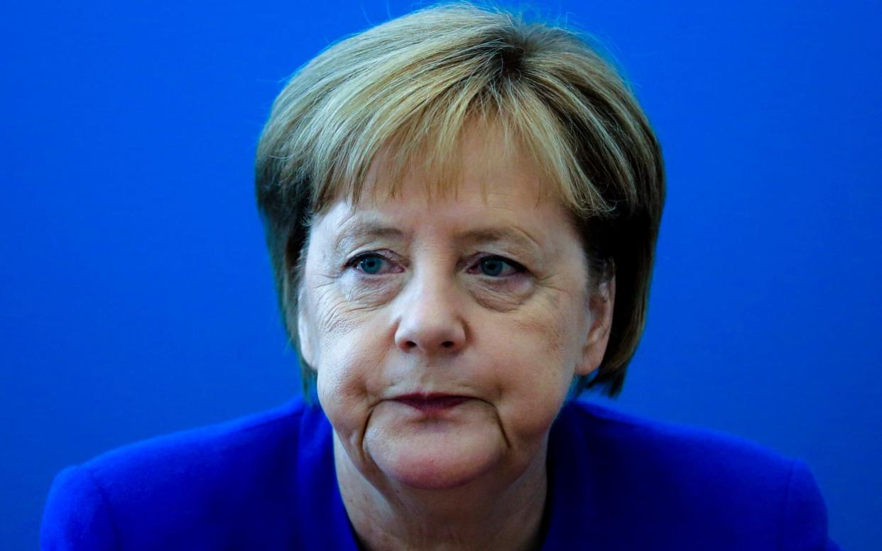 A hugely symbolic defeat within her own party looks to have paved the way for an end to Merkel's reign - AP