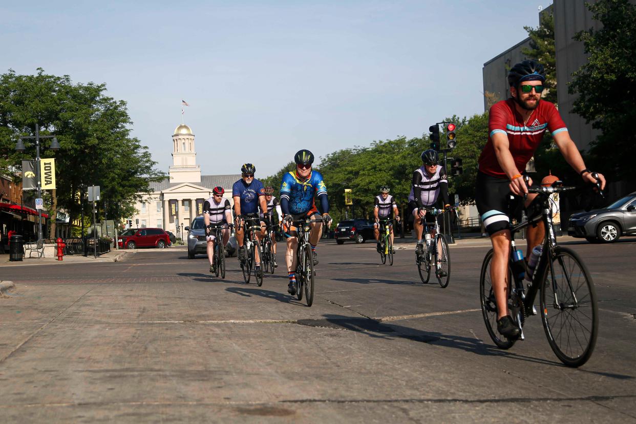 Cyclists roll out of Iowa City during the RAGBRAI route inspection pre-ride on June 10, 2023. Iowa City is the first pass-through town on the final day of RAGBRAI 50.