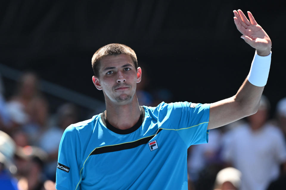 MELBOURNE, AUSTRALIA - JANUARY 15: Alexei Popyrin of Australia celebrates match point in their round one singles match against Marc Polmans of Australia during the 2024 Australian Open at Melbourne Park on January 15, 2024 in Melbourne, Australia. (Photo by Morgan Hancock/Getty Images)