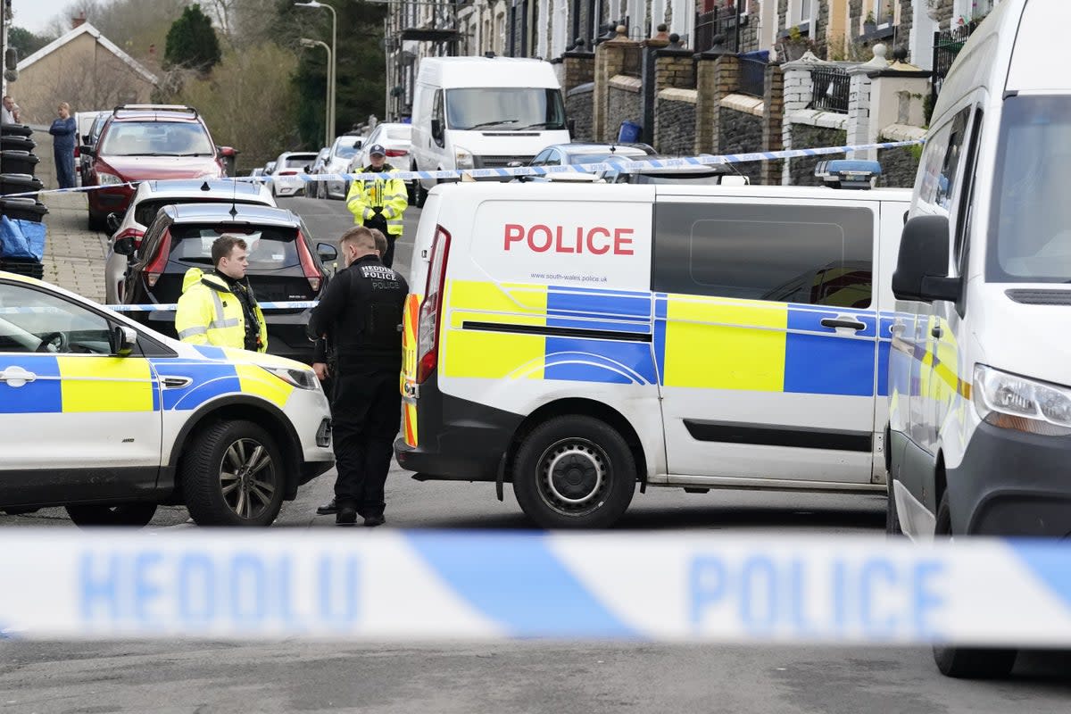 The scene on Moy Road in the village of Aberfan, Merthyr, South Wales, after a 29-year-old woman was stabbed around 9.10am on Tuesday (PA Wire)