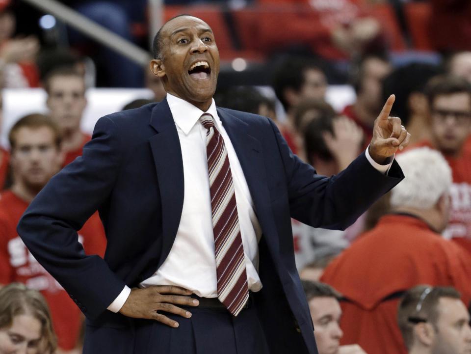 FILE - In this Dec. 18, 2012, file photo, Stanford coach Johnny Dawkins calls to his team during the second half of an NCAA college basketball game against North Carolina State in Raleigh, N.C. If Johnny Dawkins and Craig Neal were still playing _ instead of coaching _ against each other, there's no doubt which one you'd pick. The two will be back on opposing benches Friday night March 21, 2014, 28 years after they faced off as players. (AP Photo/Gerry Broome, File)