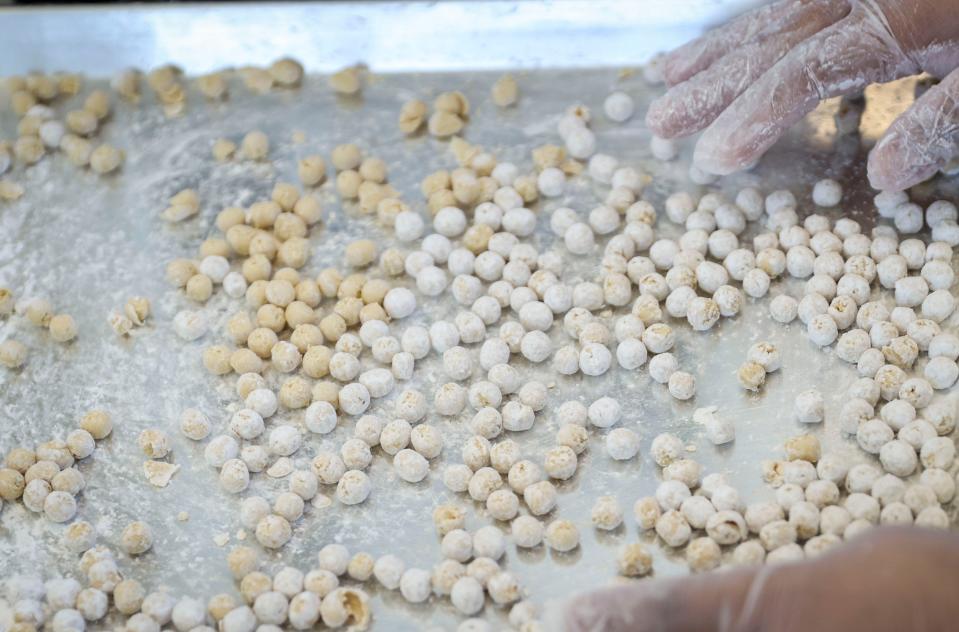 Vianey Rojas makes brown sugar boba at Bobadochi on Wednesday, April 10, 2024 in Salem, Ore.