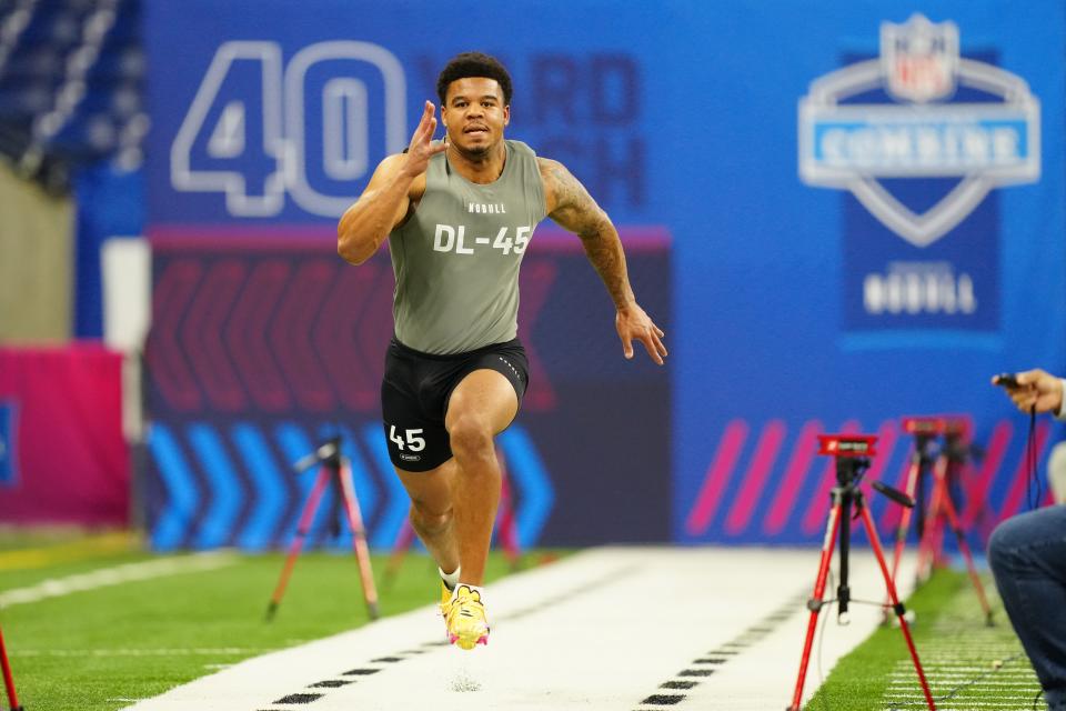 Feb 29, 2024; Indianapolis, IN, USA; Penn State defensive lineman Chop Robinson (DL45) works out during the 2024 NFL Combine at Lucas Oil Stadium. Mandatory Credit: Kirby Lee-USA TODAY Sports