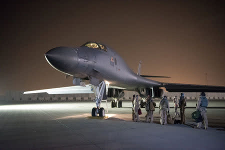 A U.S. Air Force B-1B Lancer and crew, being deployed to launch strike as part of the multinational response to Syria's use of chemical weapons, is seen in this image released from Al Udeid Air Base, Doha, Qatar on April 14, 2018. U.S. Air Force/Handout via REUTERS.