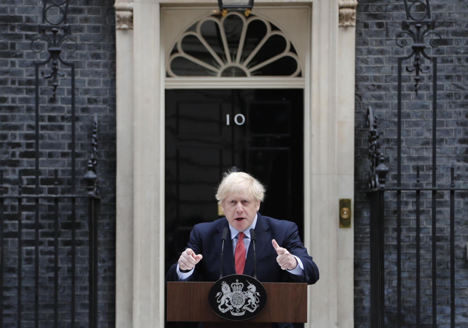 British Prime Minister Boris Johnson makes a statement on his first day back at work in Downing Street, London, after recovering from a bout with the coronavirus that put him in intensive care, Monday, April 27, 2020. The highly contagious COVID-19 coronavirus has impacted on nations around the globe, many imposing self isolation and exercising social distancing when people move from their homes. (AP Photo/Frank Augstein)