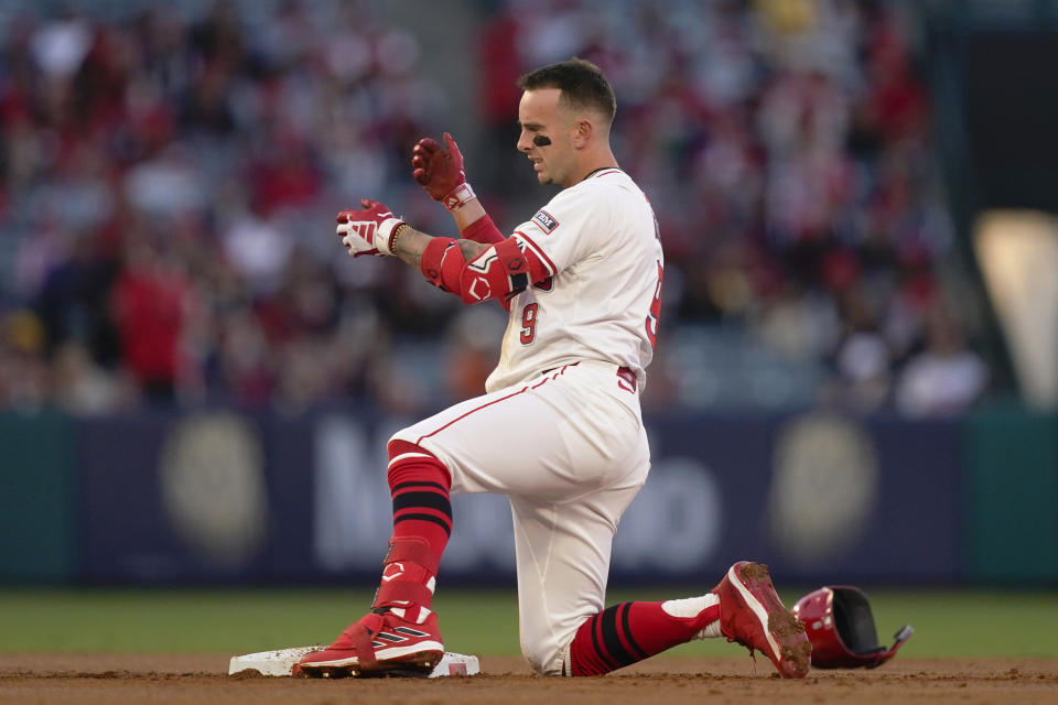 Los Angeles Angels' Zach Neto gestures after hitting a double to score Luis Rengifo during the second inning of a baseball game against the Baltimore Orioles, Tuesday, April 23, 2024, in Anaheim, Calif. (AP Photo/Ryan Sun)