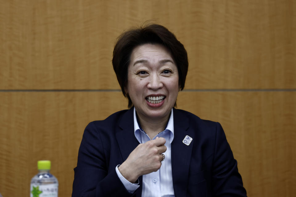 President of the Tokyo 2020 Olympics Organizing Committee Seiko Hashimoto smiles before the start of the opening remark session at a press briefing on the operation and media coverage of Tokyo 2020 Olympic Torch Relay in Tokyo Thursday, Feb. 25, 2021. (Behrouz Mehri/Pool Photo via AP)
