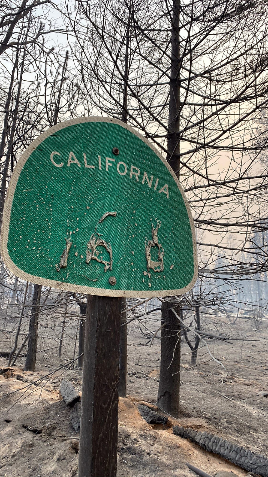 Heat from the Creek Fire melted the lettering off this roadside sign near Shaver Lake, California, on Wednesday, Sept. 9, 2020.