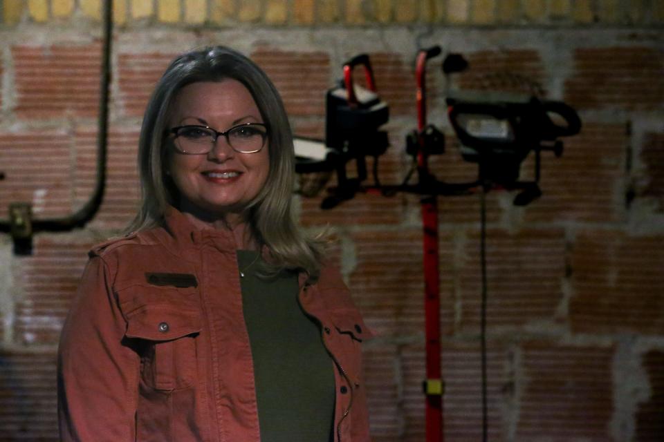 Cheryl Votzmeyer-Rios, CCPTACH (Corpus Christi Positive Action Toward Cultural Heritage) executive director, poses inside The Ritz Theatre Tuesday, Feb. 13, 2024.