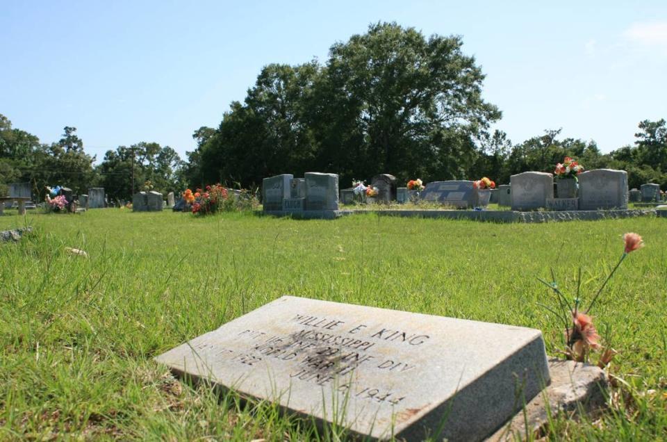 The midday sun casts light over the grave of Willie E. King, a soldier from the 29th Infantry Division who was killed in the Omaha beach landing on June 6, 1944. The grave is in Coalville Church’s cemetery in Biloxi.