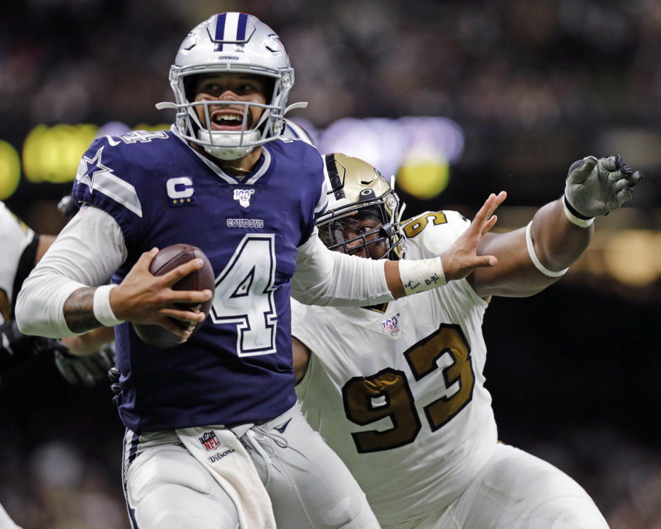 NEW ORLEANS, LA - SEPTEMBER 29:  New Orleans Saints defensive tackle David Onyemata (93) gets a sack against Dallas Cowboys quarterback Dak Prescott (4) during the game between the New Orleans Saints and the Dallas Cowboys on September 29, 2019 at the Mercedes-Benz Superdome in New Orleans, LA. (Photo by Stephen Lew/Icon Sportswire via Getty Images)