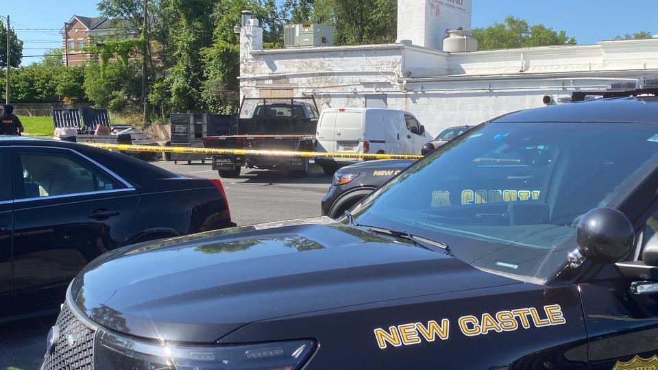 A flatbed truck used in a break-in at a New-Castle area gun store on Memorial Day sits in a parking lot near the firearms store.