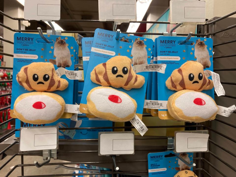 Stuffed latke and jelly doughnut-shaped cat toys at Petco.