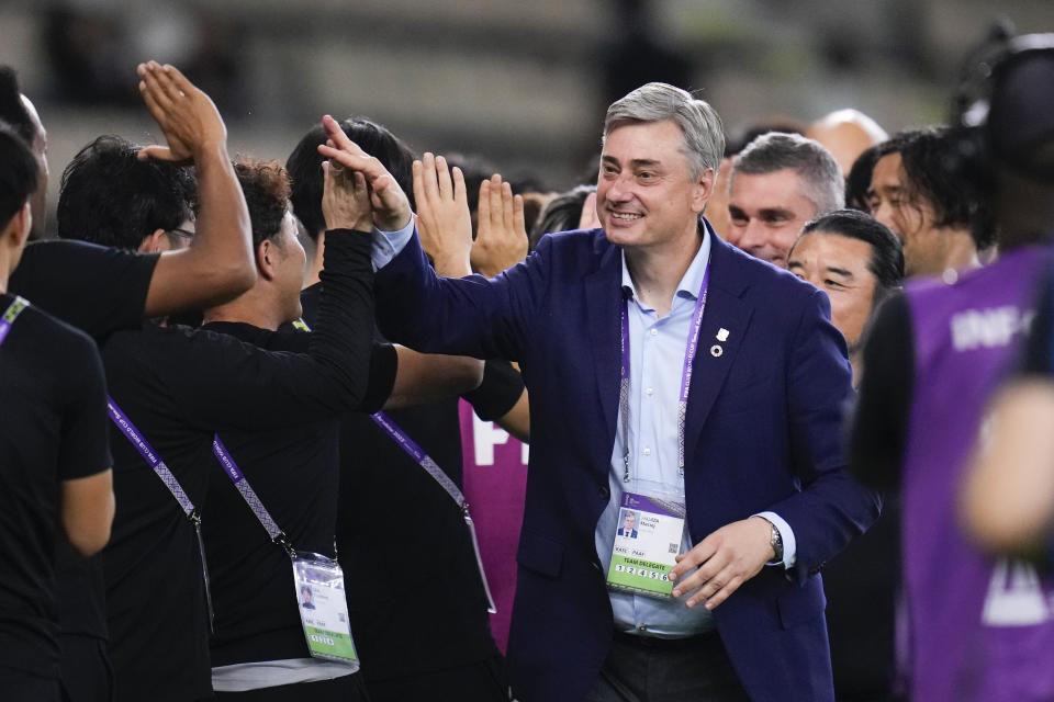 Urawa Reds' coach Maciej Skorza celebrates at the end of the Soccer Club World Cup second round soccer match between Club Leon and Urawa Reds at Prince Abdullah Al-Faisal Stadium in Jeddah, Saudi Arabia, Friday, Dec. 15, 2023. (AP Photo/Manu Fernandez)