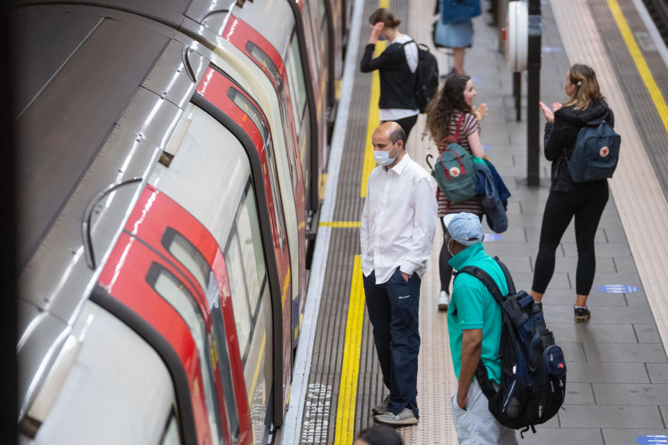 Commuters at Clapham Common underground station, London, as train services increase this week as part of the easing of coronavirus lockdown restrictions.