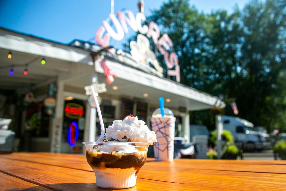 A turtle sundae consisting of vanilla ice cream, chocolate and caramel sauce with pecans is seen topped with whipped cream and a cherry at the Funcrest Dairy & Grill on Thursday near the Coralville Lake Dam.