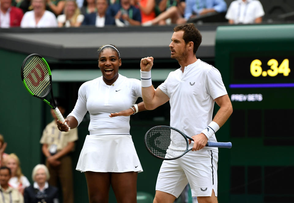 Serena Williams celebrates with Andy Murray in their Wimbledon Mixed Doubles second round match. (Photo by Mike Hewitt/Getty Images)