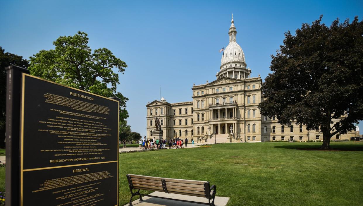 A group of students head inside the Michigan State Capitol for a tour, Monday, June 5, 2023.