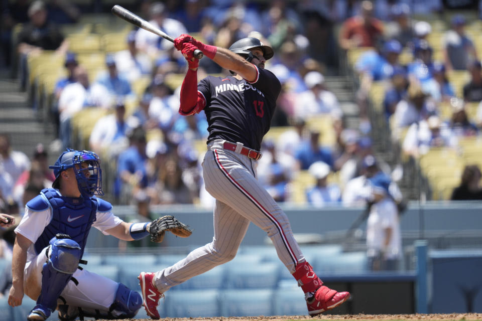 Minnesota Twins' Joey Gallo (13) hit a home run during the sixth inning of a baseball game against the Los Angeles Dodgers in Los Angeles, Wednesday, May 17, 2023. (AP Photo/Ashley Landis)