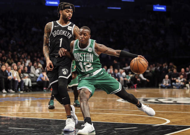 Terry Rozier of the Charlotte Hornets looks on during the game