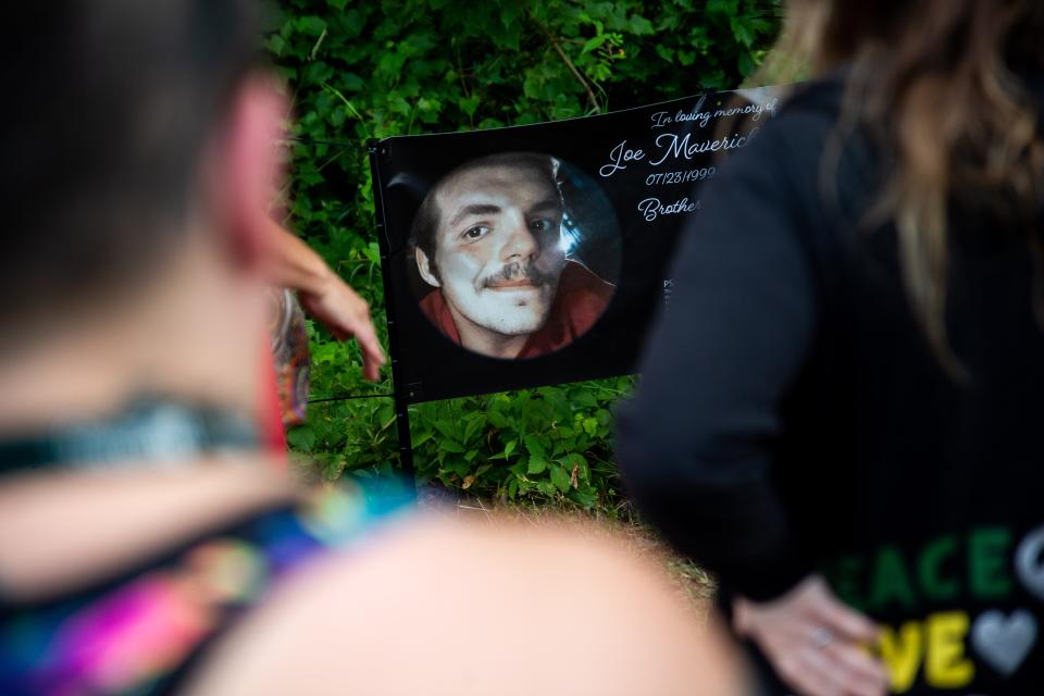 A memorial is placed during a vigil for Joey Nagle Thursday, June 30, 2022, along 26th Street in Hopkins. During a traffic stop, Nagle, 22, was killed by an Allegan County Deputy.