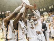 Wichita State celebrates defeating Missouri State 68-45 in an NCAA college basketball game in Wichita, Kan., Saturday, March 1, 2014. (AP Photo/The Wichita Eagle, Fernando Salazar) LOCAL TV OUT; MAGS OUT; LOCAL RADIO OUT; LOCAL INTERNET OUT