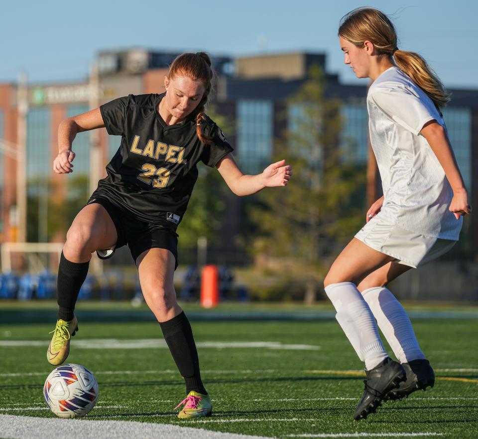 Lapel Bulldogs Jocelyn Love (23) kicks the ball Tuesday, Oct. 3, 2023, during the IHSAA sectional semifinals at Heritage Christian High School in Indianapolis. The Lapel Bulldogs defeated the Scecina Crusaders, 6-2.
