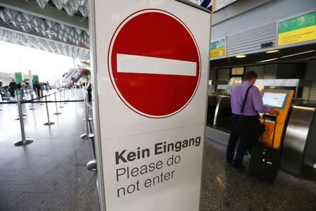 A sign is pictured during a strike at the Frankfurt airport, in Frankfurt September 5, 2014. REUTERS/Ralph Orlowski