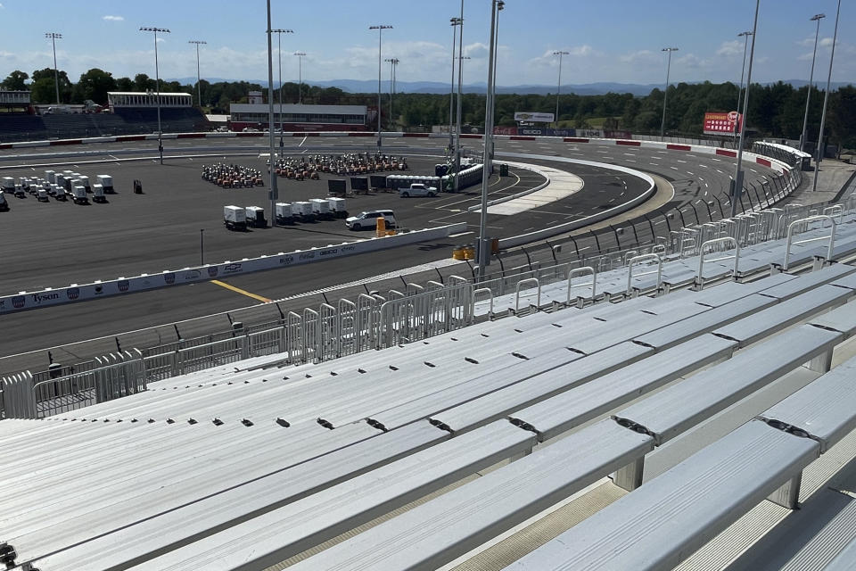 The new grandstands are shown at the North Wilkesboro Speedway on Wednesday, May 10, 2023, in Wilkesboro, N.C. North Wilkesboro Speedway was chosen to host the All-Star race for NASCAR's celebratory 75th anniversary season, and restoration on the track shifted into full gear. (AP Photo/Steve Reed)