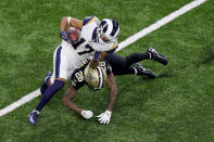 <p>Robert Woods #17 of the Los Angeles Rams is tackled by P.J. Williams #26 of the New Orleans Saints in the first half in the NFC Championship game at the Mercedes-Benz Superdome on January 20, 2019 in New Orleans, Louisiana. (Photo by Jonathan Bachman/Getty Images) </p>