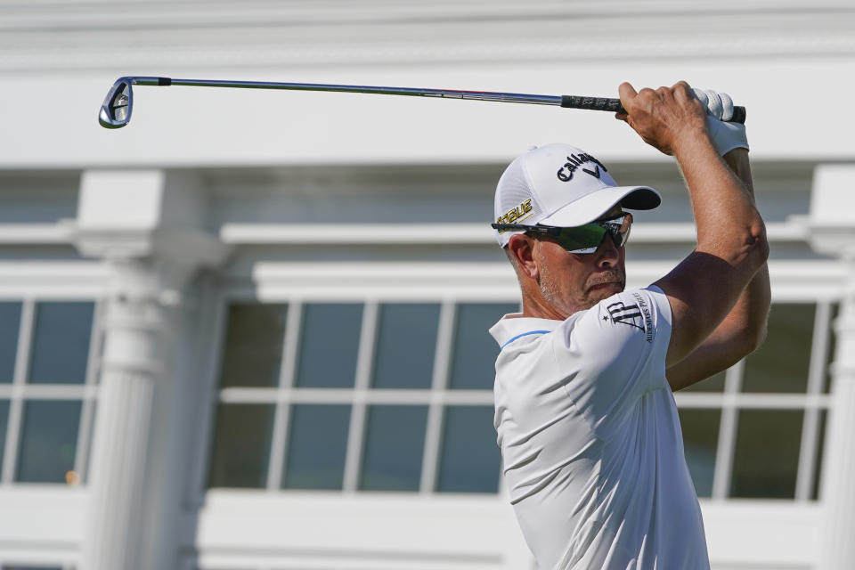 Henrik Stenson hits off the 16th tee during the second round of the Bedminster Invitational LIV Golf tournament in Bedminster, N.J., Saturday, July 30, 2022. (AP Photo/Seth Wenig)