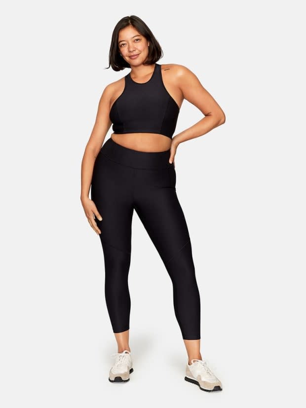 Outdoor Voices Athena Crop Top, $45, <a href="https://rstyle.me/+UKZtVSGRj1oIYR12MDSzpw" rel="nofollow noopener" target="_blank" data-ylk="slk:available here;elm:context_link;itc:0;sec:content-canvas" class="link ">available here</a>, and 3/4 Warmup Leggings, $75, <a href="https://rstyle.me/+4WCODyZ0JcIl52uc_7bEhg" rel="nofollow noopener" target="_blank" data-ylk="slk:available here;elm:context_link;itc:0;sec:content-canvas" class="link ">available here</a>.<br>