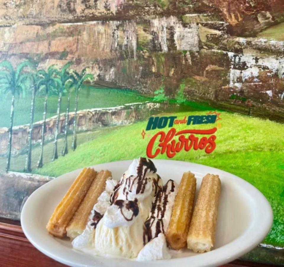 Fresh churros at El Familiar in Toms River come topped with vanilla ice cream drizzle in chocolate, whipped cream, and stuffed with dulce de leche.