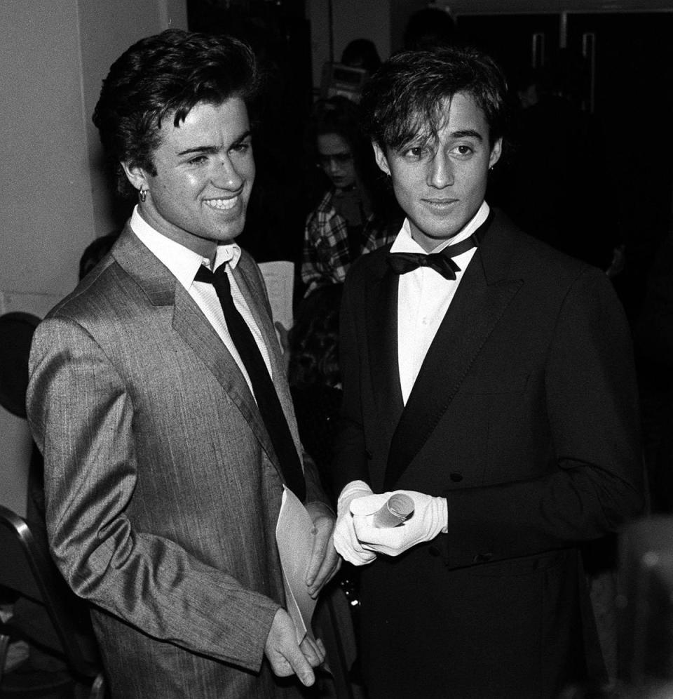 With Wham! partner Andrew Ridgeley in March 1984 (PA)