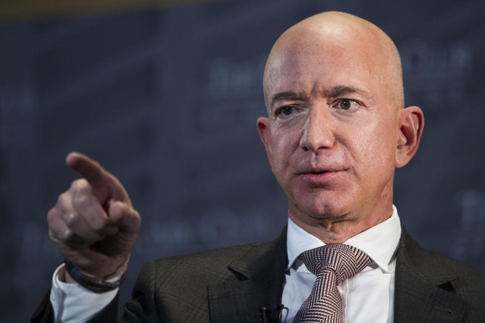 Jeff Bezos, Amazon founder and CEO, speaks at The Economic Club of Washington's Milestone Celebration in Washington, Thursday, Sept. 13, 2018. Bezos said Thursday that he is giving $2 billion to start the Bezos Day One Fund which will open preschools in low-income neighborhoods and give money to nonprofits that helps homeless families. (AP Photo/Cliff Owen)