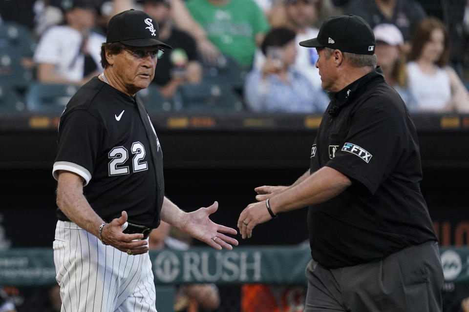 Chicago White Sox manager Tony La Russa, left, talks with umpire Marvin Hudson after the benches cleared during the second inning of the team's baseball game against the Baltimore Orioles in Chicago, Friday, June 24, 2022. (AP Photo/Nam Y. Huh)