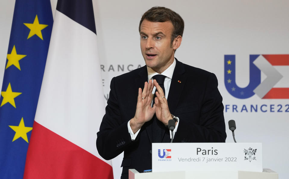 French President Emmanuel Macron speaks as he participates in a media conference with European Commission President Ursula von der Leyen after a meeting at the Elysee Palace in Paris, France, Friday, Jan. 7, 2022. (AP Photo/Michel Euler, Pool)