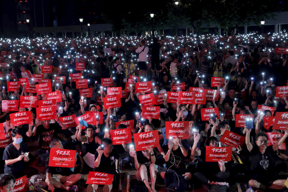 Protesters take part in a rally in Hong Kong, Wednesday, June 26, 2019. Thousands of people joined Hong Kong's latest protest rally Wednesday night against legislation they fear would erode the city's freedoms, capping a daylong appeal to world leaders ahead of a G-20 summit this week that brings together the heads of China, the United States and other major nations. (AP Photo/Kin Cheung)