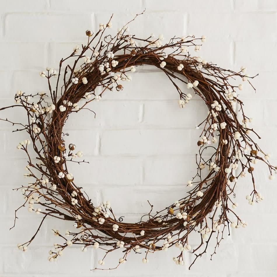 <p><strong>Bloomist</strong></p><p>bloomist.com</p><p><strong>$98.00</strong></p><p>The delicate white berries on this faux wreath make it a perfect transition piece from winter to spring. </p>