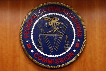 FILE PHOTO: The Federal Communications Commission (FCC) logo is seen in Washington February 26, 2015. REUTERS/Yuri Gripas