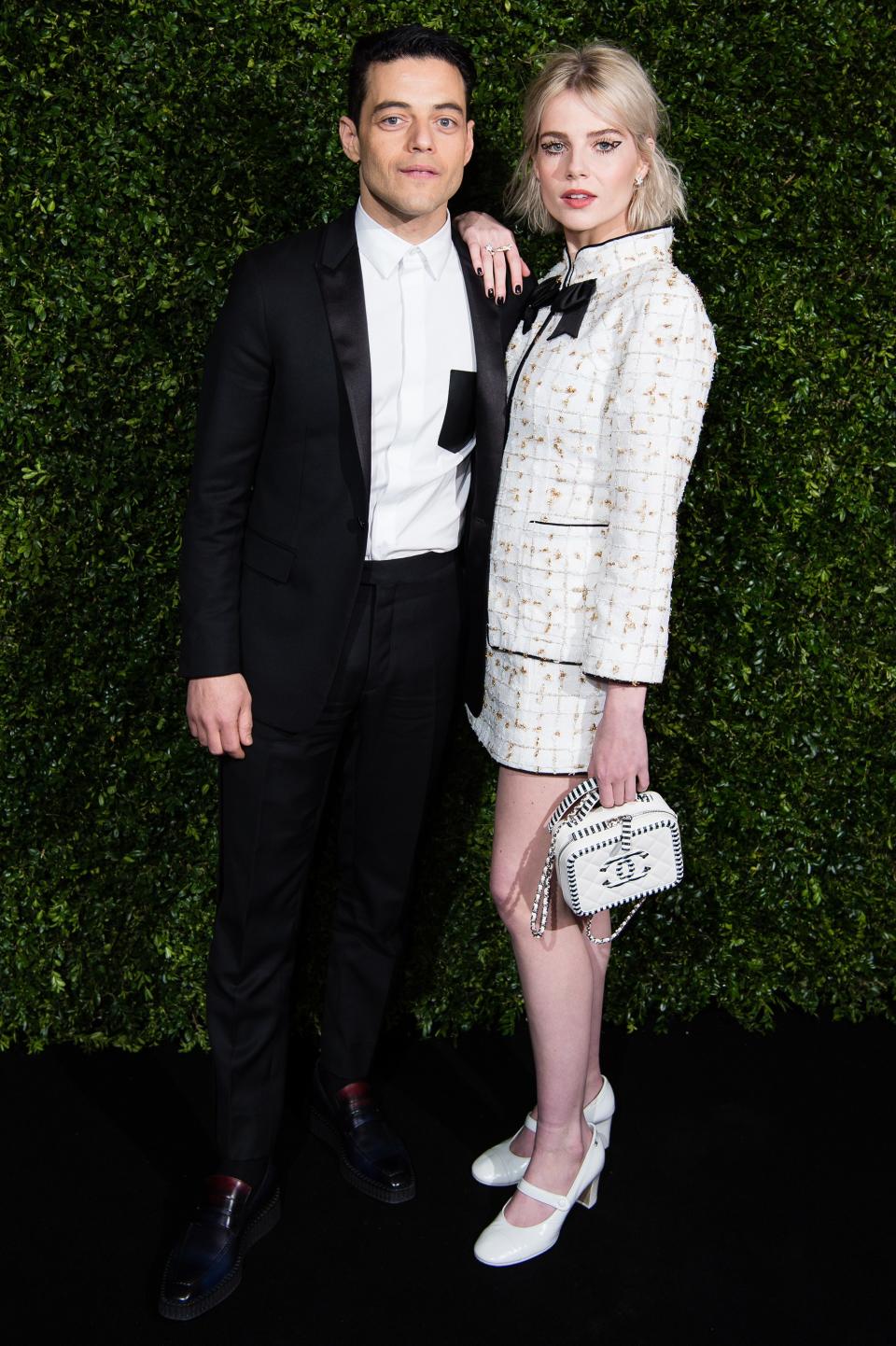 Rami Malek and Lucy Boynton attend the Charles Finch & Chanel pre-Bafta dinner at Loulou’s